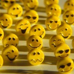 Still life of a group of yellow happy faces with various expressions